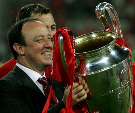 Liverpool's coach Rafael Benitez, holds the trophy after Liverpool's victory in the UEFA Champions League Final between AC Milan and Liverpool at the Ataturk Olympic Stadium in Istanbul, Turkey,Wednesday May 25, 2005. Liverpool won the match 3-2 on penalties.(AP Photo/Alastair Grant)