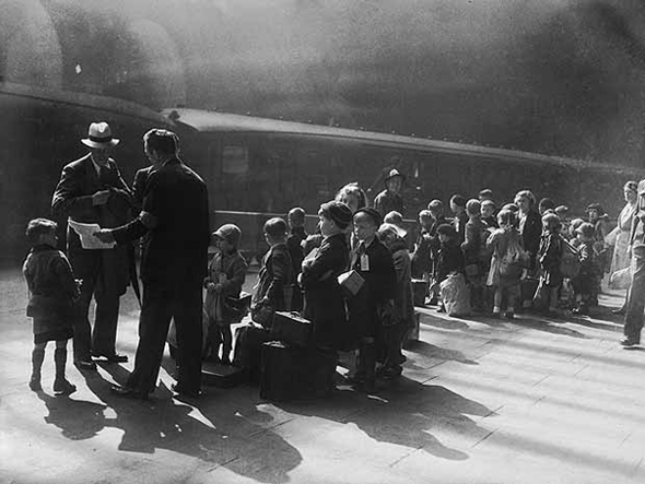Evacuees Leave Liverpool...A group of 317 evacuee children wait at a railway station in Liverpool before travelling to safer areas, 27th August 1942. (Photo by Keystone/Hulton Archive/Getty Images)